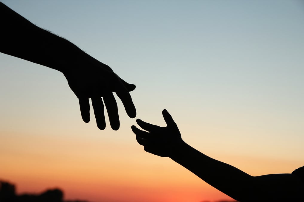 silhouette parent and child hands